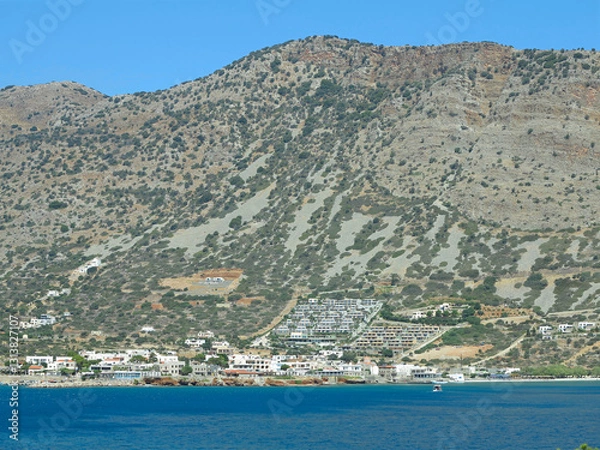 Fototapeta 08.07.2024, Elounda, Crete, Greece: View of the port and city on island of Crete