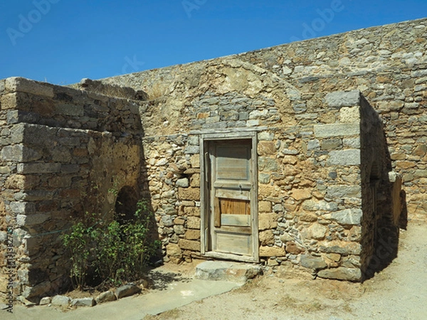 Fototapeta View on ruins of Spinalonga Fortressi, Former leper colony, Crete, Greece