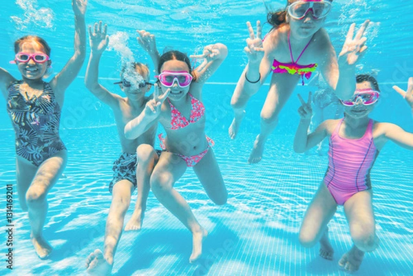 Obraz Children play in  pool at the resort