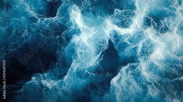 Fototapeta Dynamic ocean waves with churning white foam and deep blue water