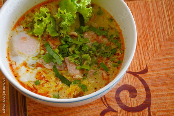 Fototapeta noodle tom yam with  soft boiled egg
