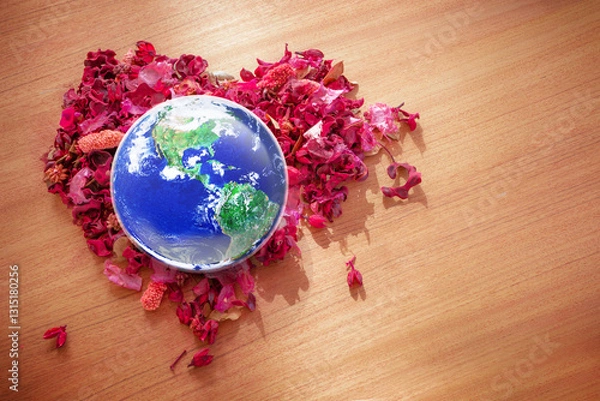 Fototapeta Earth in Heart shape dry flowers on wood table in sunlight, Love and Save the World for the Next Generation concept, Earth day concept, Elements of this image furnished by NASA