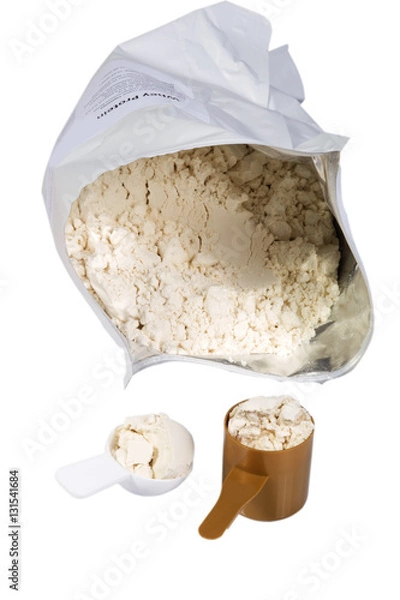 Obraz White bag with vanilla whey protein opened. Two scoops with protein powder for muscle gaining, small white and bigger brown. Isolated on white background.