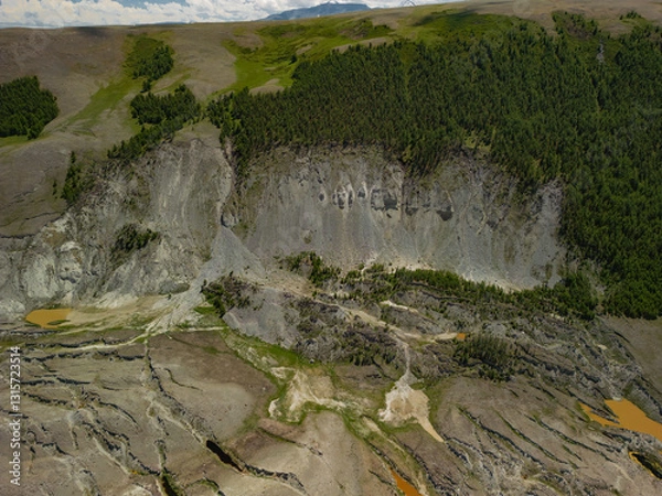 Fototapeta The consequences of the earthquake in Altai. The epicenter of the earthquake is in the mountains, which disappears over time. Consequences of a natural disaster.