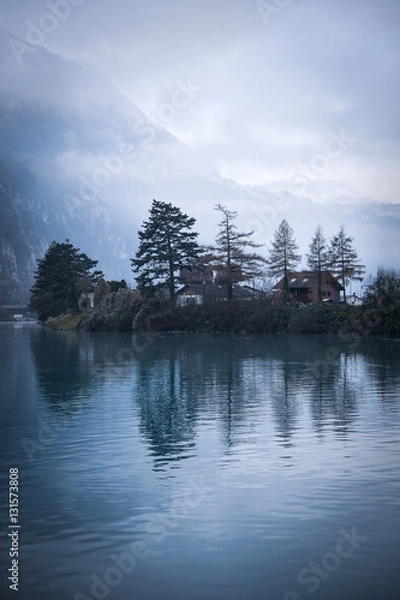 Fototapeta Foggy lake atmosphere in Interlaken , Switzerland on 30 November 2016