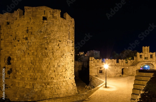 Obraz Fortress and lighthouse at harbor of Rhodes island in Greece