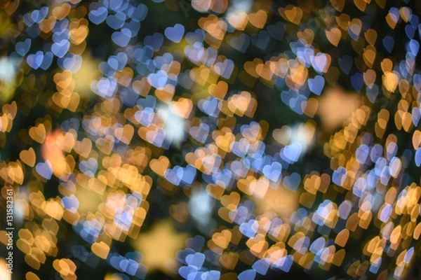Fototapeta blurred background image : Heart bokeh on blurred background.