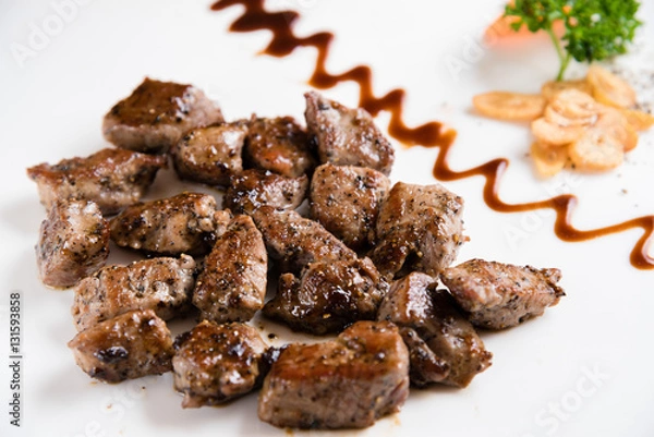 Obraz Beef Steak Served on a Sizzling Iron Plate