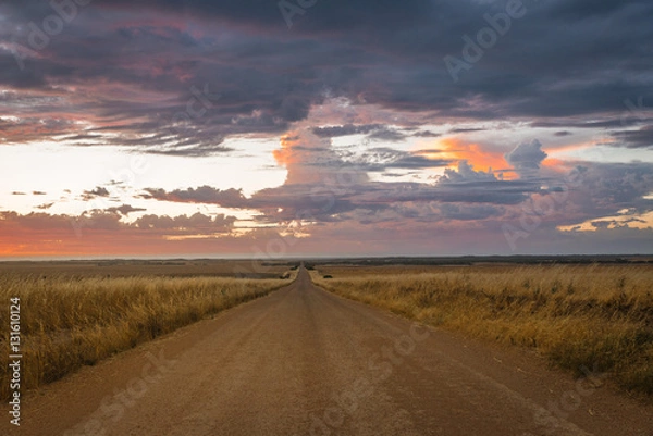 Obraz Dramatic moody sunset over dirt road in rural Australian outback