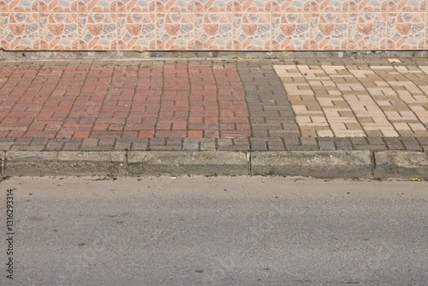 Obraz view of the empty road scene, highway in the city, trees and bushes, curb stone and white road markings, minimalism in the city, 2