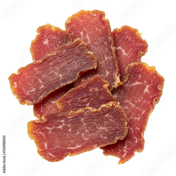 Fototapeta Slices and pieces of dried meat ready for snacking or cooking.