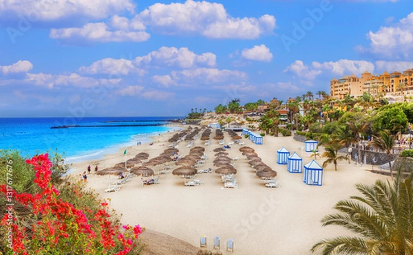 Fototapeta Stunning View of El Duque Beach with Golden Sand, Turquoise Waters, and Luxurious Resorts in Tenerife, Canary Islands