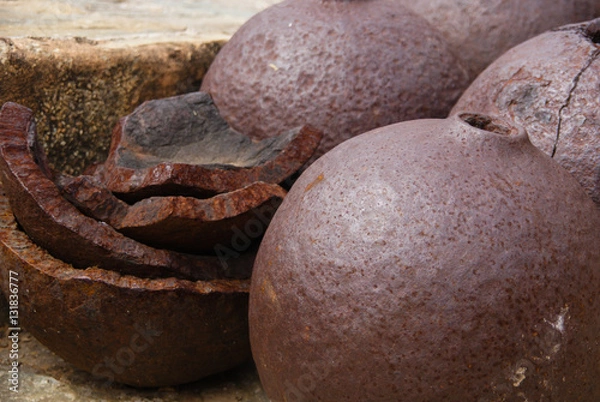 Obraz Old cannonballs of historic importance in display in a museum.  