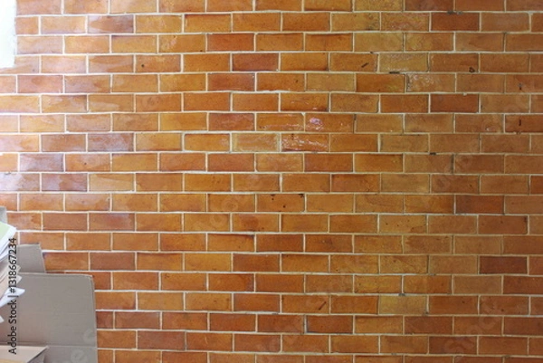 Fototapeta Wide cream brick wall with beige, old brown brick and limestone textures, perfect for abstract backgrounds
