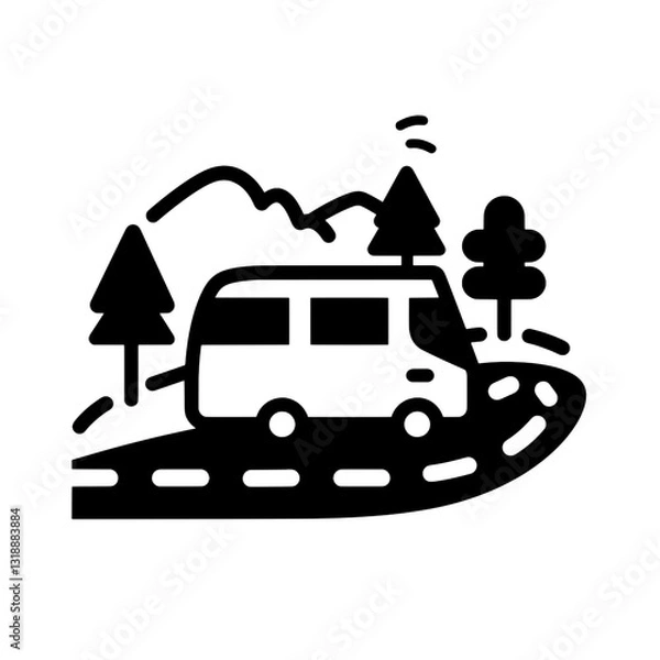 Fototapeta Adventure through winding roads in a camper van surrounded by mountains and trees