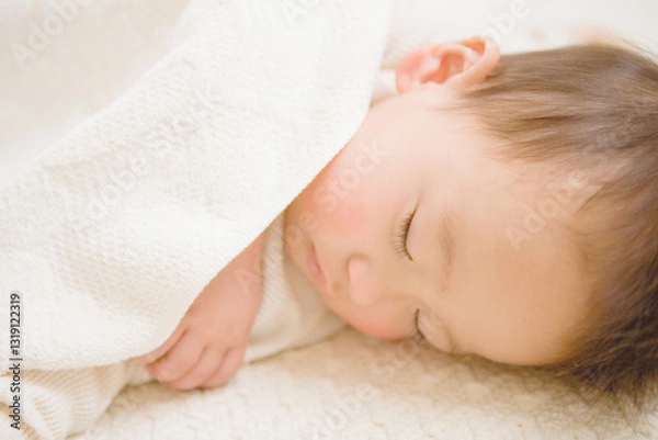 Obraz オーガニックコットンに包まれた生後16ヶ月の男の子