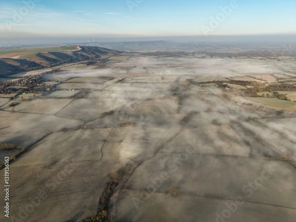 Obraz Stunning aerial drone landscape sunrise image of atmospheric cloud inversion over South Downs escarpment