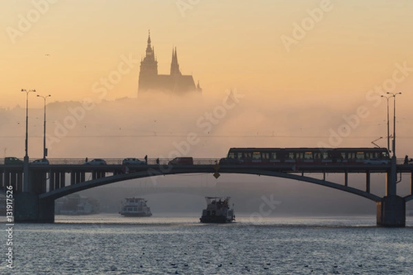 Fototapeta View of Prague Castle and boats in the fog