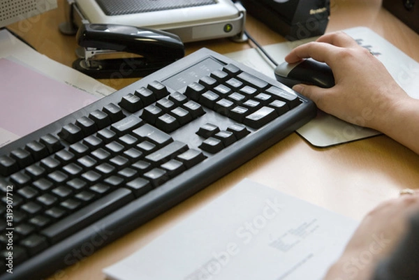 Obraz At the office. Administration office. Hand with keyboard of a computer.