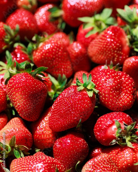 Fototapeta Close-up of fresh, ripe strawberries with vivid red color and perfect texture