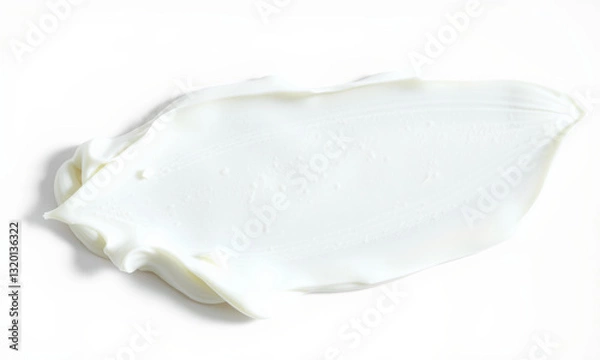 Fototapeta smooth, creamy white substance spread across surface, resembling thick layer of frosting or lotion, evoking sense of freshness and purity