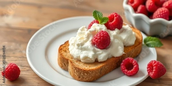 Obraz Two slices whole wheat toast topped with creamy cottage cheese and fresh raspberries,  still life, quick breakfast