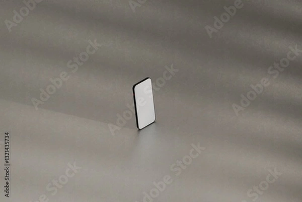 Fototapeta Mockup smartphone on grey studio floor. Hit by sunlight. Use as template for UX designs, websites, ads, and more