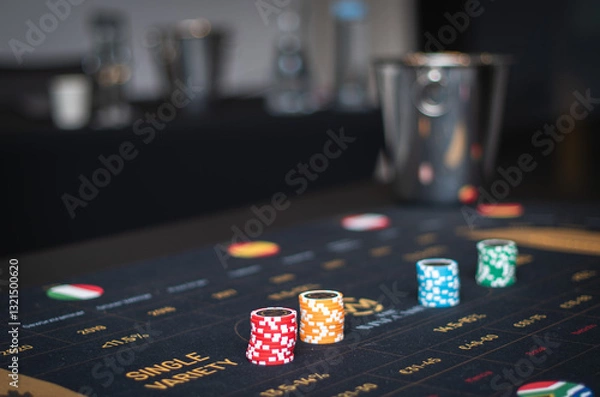Fototapeta A table with a wine casino game. Multi-colored chips with bets on different types of wine.
