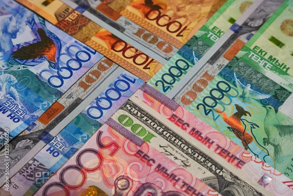 Fototapeta Tenge banknotes of different denominations and dollars in the form of a cross