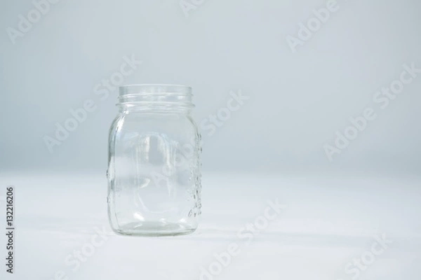 Fototapeta Close-up of empty glass jar
