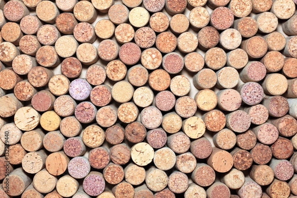 Fototapeta Wall of many different wine corks. Closeup of wine corks. Wine corks with traces of wine and corkscrew.