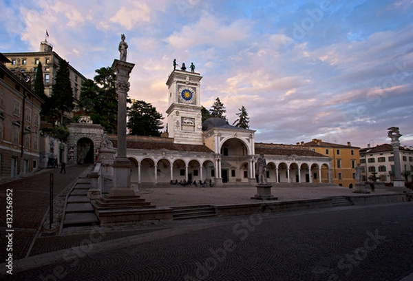 Fototapeta Piazza Libertà in Udine with the Loggia of San Giovanni and column of justice at sunset. Italy.