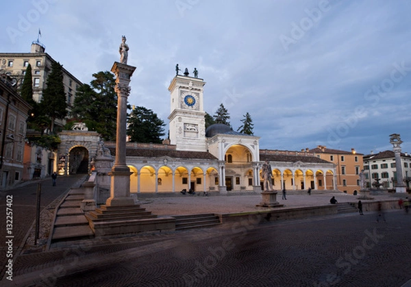 Fototapeta Piazza Libertà in Udine with the Loggia of San Giovanni and column of justice by night. Italy.