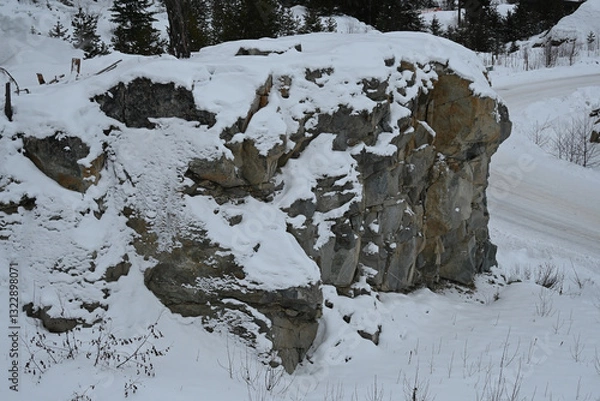 Fototapeta Mountain boulder covered with a snow mantle, a winter view_20250208_DSC_2704