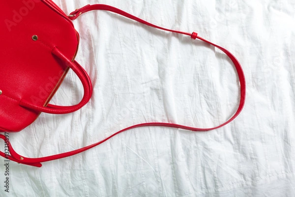 Obraz Female bag on white textile