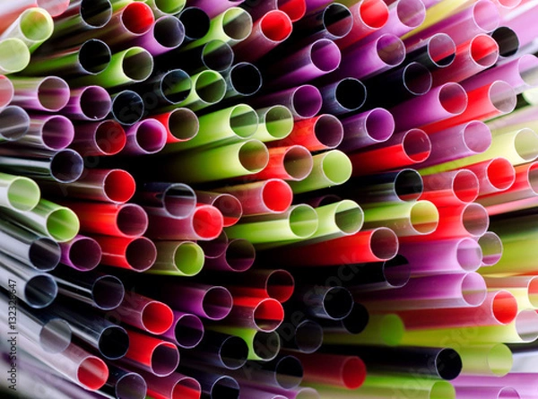 Fototapeta multi-colored sticks for drinks close-up. Abstract background
