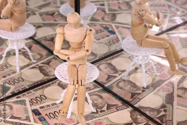 Obraz 鏡に映る1万円札と木の人形