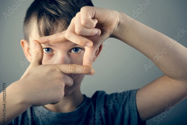 Obraz Boy framing with hand