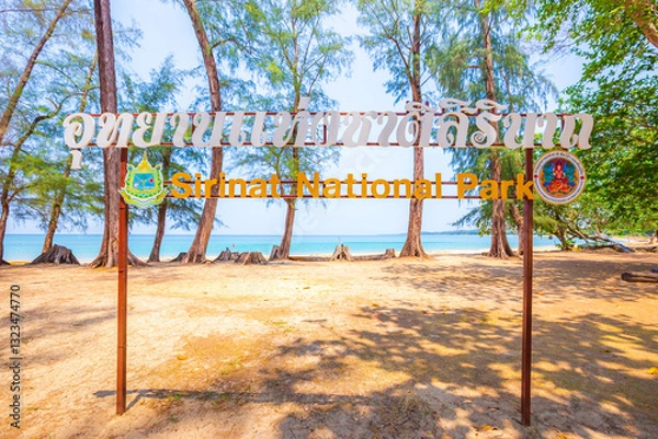 Obraz Sign label of "Sirinat National Park" on the beach of Sirinat National Park, Phuket Thailand, Asia. Travel destination of Phuket.