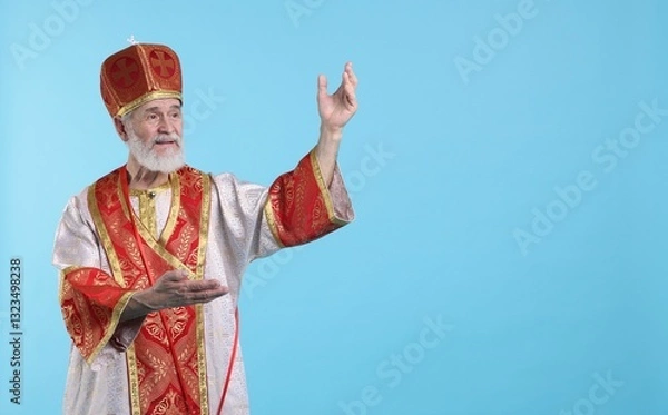 Obraz Saint Nicholas on light blue background. Space for text