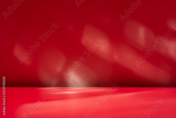 Obraz Empty table on dark red wall background. Composition with abstract shadow on the wall and pink table. Mock up for presentation, branding products, cosmetics, food or jewelry.	
