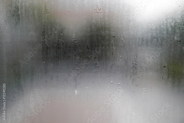 Obraz Water drop on glass windows background