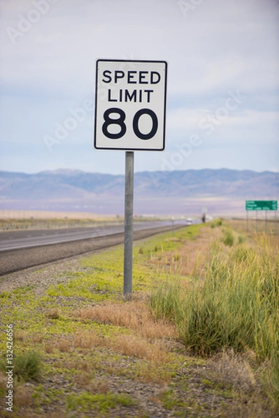 Obraz Speed limit 80 sign along highway