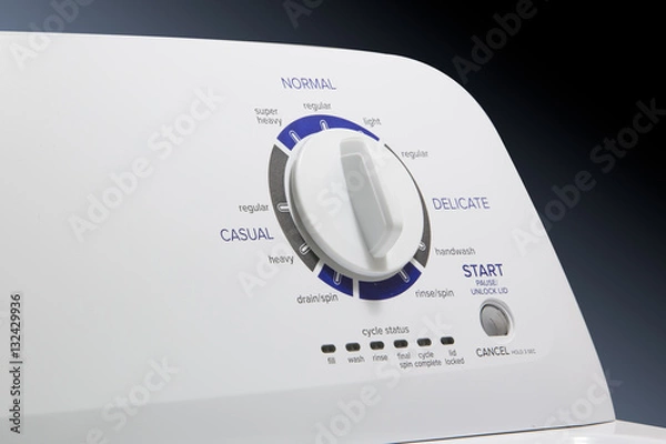 Obraz Washing Machine-Select Knob - Clothes washer front panel with a focus on the washer cycle/selector knob. Straight lighting.