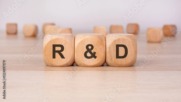 Fototapeta wooden blocks with text R and D on it. R and D stands for Research and Development