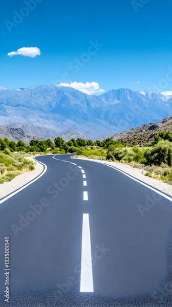 Obraz Winding road leading to mountains under a vibrant blue sky