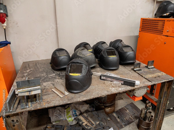 Obraz Metalworking: a welding mask on a workbench.