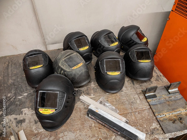 Obraz Metalworking: a welding mask on a workbench.
