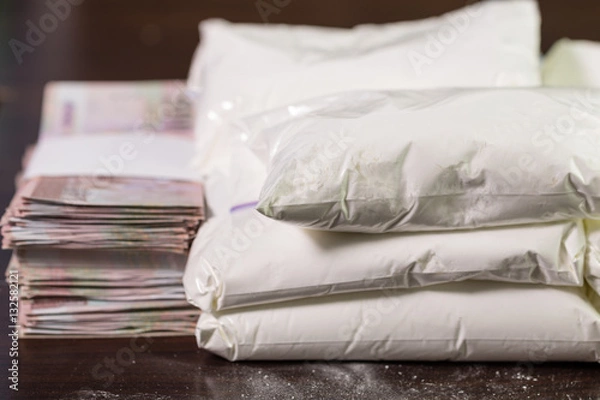 Obraz Bags of drugs, and money on table