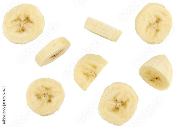Obraz Flying banana slices isolated on a transparent background. Completely in focus. Full depth of field. PNG.